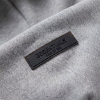 Fear of God Essentials S24 Fleece Hoodie Light Heather Grey – Gumové 3D logo