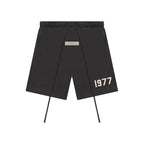 šortky Fear of God Essentials 1977 Shorts Iron ADONIO