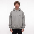 Fear of God Essentials S24 Fleece Hoodie Light Heather Grey – model foto